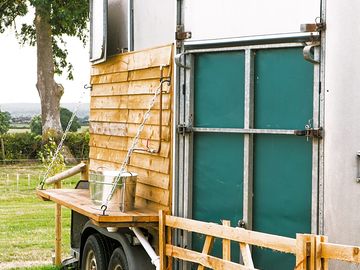 Toilet/shower trailer and water point.taken by boutique camping.