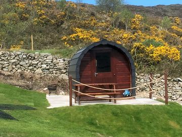 The blue tractor camping pod
