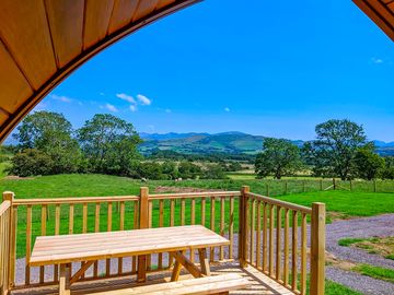 View out from under the archway of the camping pod