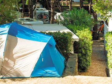 Partially shaded tent pitches