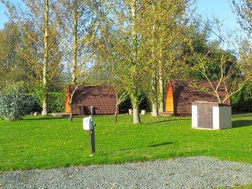 Caravan pitches and pods in the Kerry field