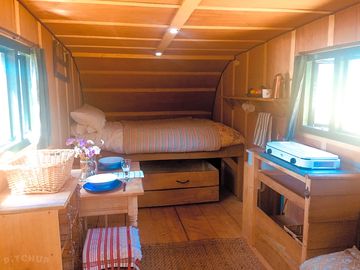 Bed, two-ring burner and pull-out child's bed box