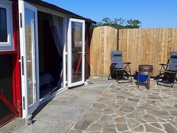 Private patio area for the firepit and barbeque