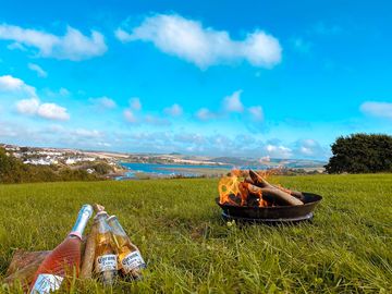 Camping, sunshine, campfire, friends, views & a nice cold drink, perfect.