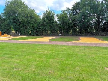 3 meter wide hardstanding pitches with 6 meter spacing, 9 meters deep with electric hook up
