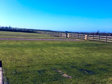 Fully serviced pitches (hardstanding and grass, or grass mesh and grass)