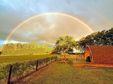 Beautiful rainbow over our rainbow view glamping pod