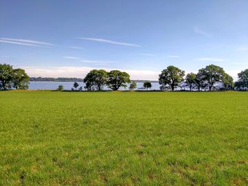 Field with river views