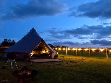 Bell tent after dark
