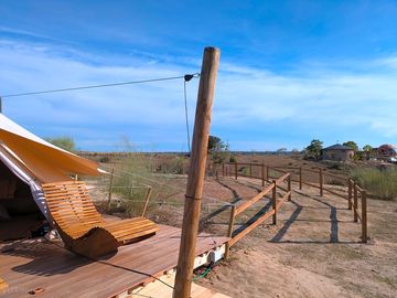 Terrace seating outside the bell tent