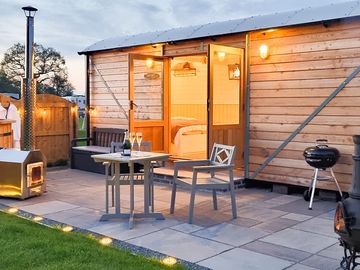 While you're waiting for your wood-fired hot tub to warm up, what about a glass of bubbly?