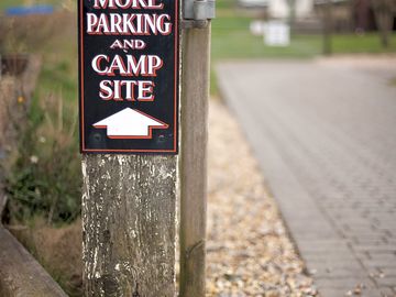 Block-paved access to the camping field which is situated away from the pub and road