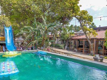 Swimming pool with waterslide