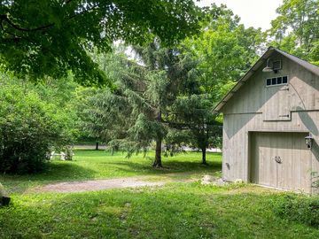 RV and camper parking to the left of the barn