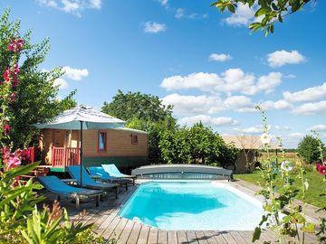 The pool in the middle of the garden