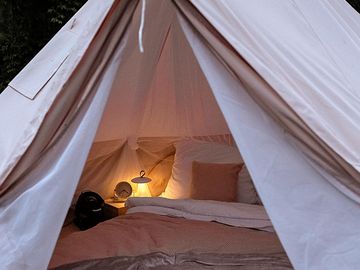 The tent lit up at night