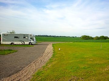 Looking down the site, across the fields