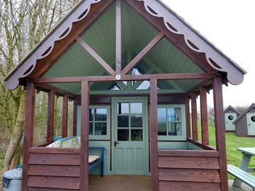The cabin with the extra sleeping pods behind