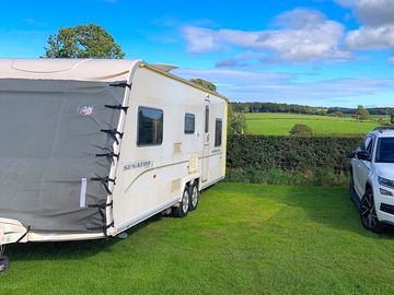 Our tourer on a grass electric pitch