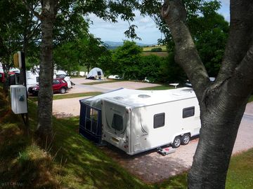 Pitches among trees and greenery