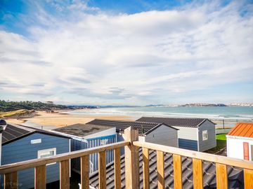 View of chalet and beach