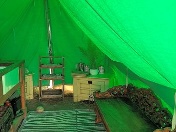 Kitchen tent with fridge freezer, microwave, kettle, toaster, crockery & cutlery