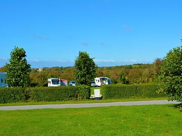 Grass pitches with stunning views of Cornish engine houses