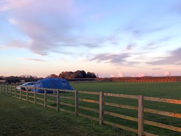 Clear autumn skies over the camping field