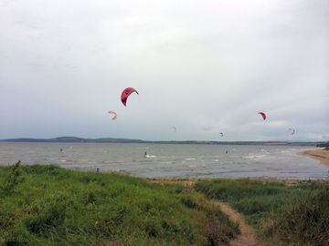 Kite surfing is very popular. lessons can be booked or just makes for great viewing