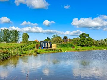 Shepherd's hut by the water