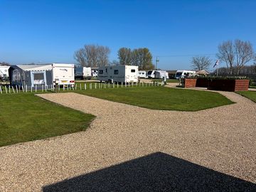 Electric grass tent pitch