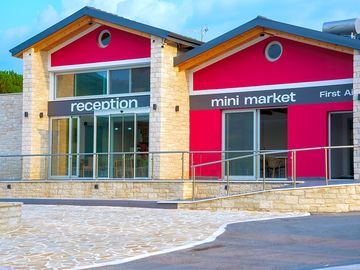 Reception, mini market and first-aid facility