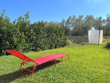 Outdoor shower and lounger