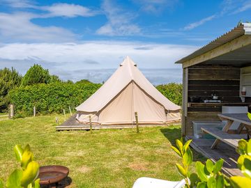 Bell tent with private kitchen and dining shelter