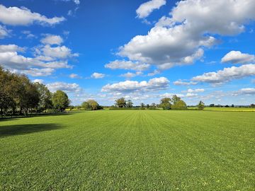 Meadow with views of the countryside