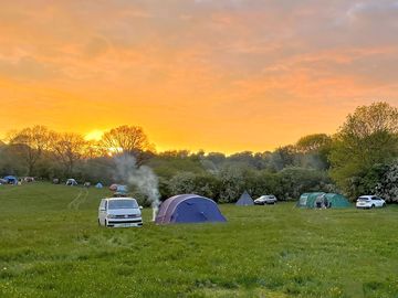 Visitor image of the camping field at sunset