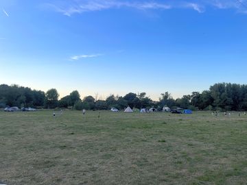 Camping field at sunset