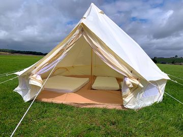 Sleeps four. mattresses included but no bedding provided.