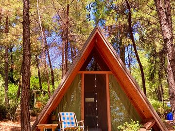 The exterior of the A-frame cabin