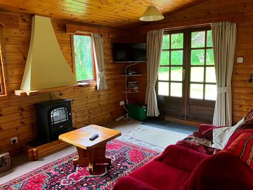 Living room area with freeview tv and dvd player