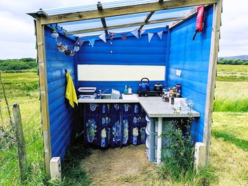Kitchen with double gas hob and kitchen utensils. cool box available on request