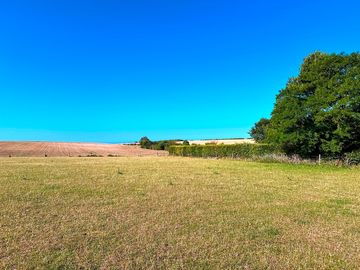 Camping field with coastal view