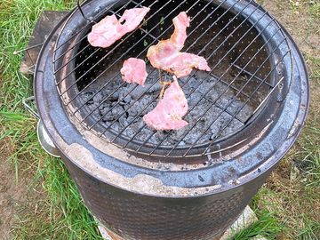 Outdoor cooking on a fire pit
