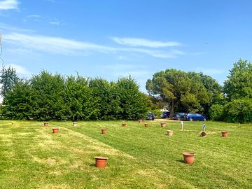 Electric hardstanding and grass pitch