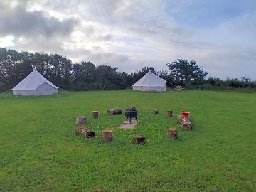 Makira tents with log seating