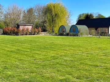 Camping field with pottery studio and artist pods