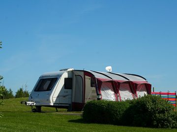 Touring caravan and awning at ballyness