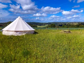 Bell tent with picnic table