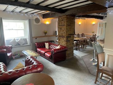 Cosy seating area with logburner