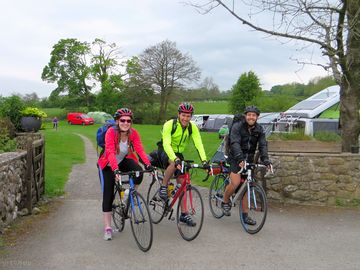 Cyclists departing from the site